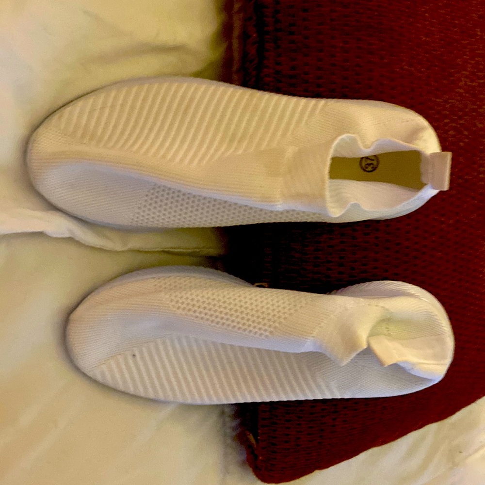 White stretchy high top sneakers need a good wash one small spot